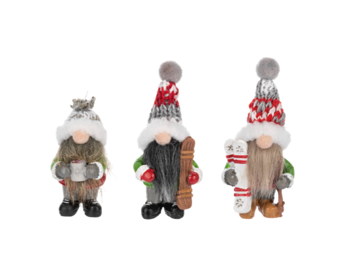 Assorted Ganz Snow Much Fun Gnome charms including a gnome with hot cocoa and a gnome on skis. Available at Be Charmed