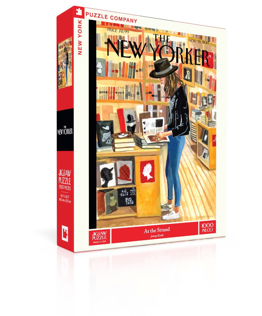 New York Puzzle Co At The Strand 1000 piece jigsaw puzzle featuring an illustrated bookstore scene available at Be Charmed