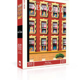 New York Puzzle Co Hot Dogs 1000 piece jigsaw puzzle featuring an illustrated apartment window scene of dogs available at Be Charmed