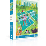 New York Puzzle Co Pickleball 500 piece jigsaw puzzle featuring a vibrant city park illustration by Jenny Kroik available at Be Charmed