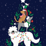 Pictura Christmas Tree Dogs Christmas card featuring a cute dogs decorating a crhistmas tree available at Be Charmed