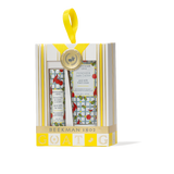 Gift set with a yellow ribbon on a white background. Available Be Charmed