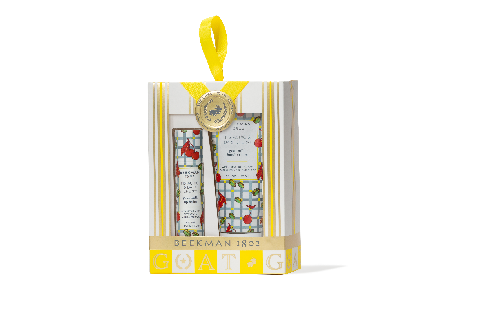Gift set with a yellow ribbon on a white background. Available Be Charmed