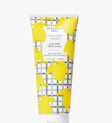 Sunshine Lemon Beekman 1802 Goat Milk Hand Lotion in a 12.5oz bottle, featuring a blend of goat milk, shea butter, and jojoba oil for deep hydration, available at Be Charmed 