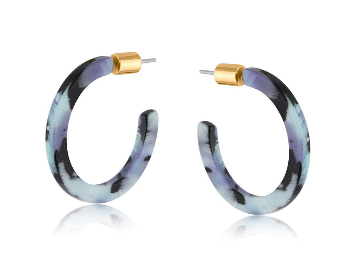 Big Metal London Resin Skinny Sylvia Lilac Earrings – pastel lilac resin hoops with gold-tone accents, handmade and hypoallergenic – Available at Be Charmed