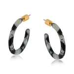 Big Metal London Hortense thin resin hoop earrings in black‑grey‑white marbled resin, approx. 2.8 cm diameter, hypoallergenic surgical steel posts, ultra‑lightweight sustainable earrings. Available at Be Charmed