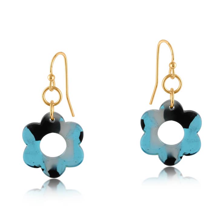 Flower-shaped resin earrings with gold hooks on a white background. Available at Be Charmed