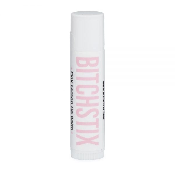 Bitchstix Pink Lemon SPF 30 Lip Balm tube featuring bold pink branding and SPF 30 protection, available at Be Charmed.