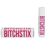 Pomegranate Bitchstix lip balm and packaging on a white background. Available at Be Charmed