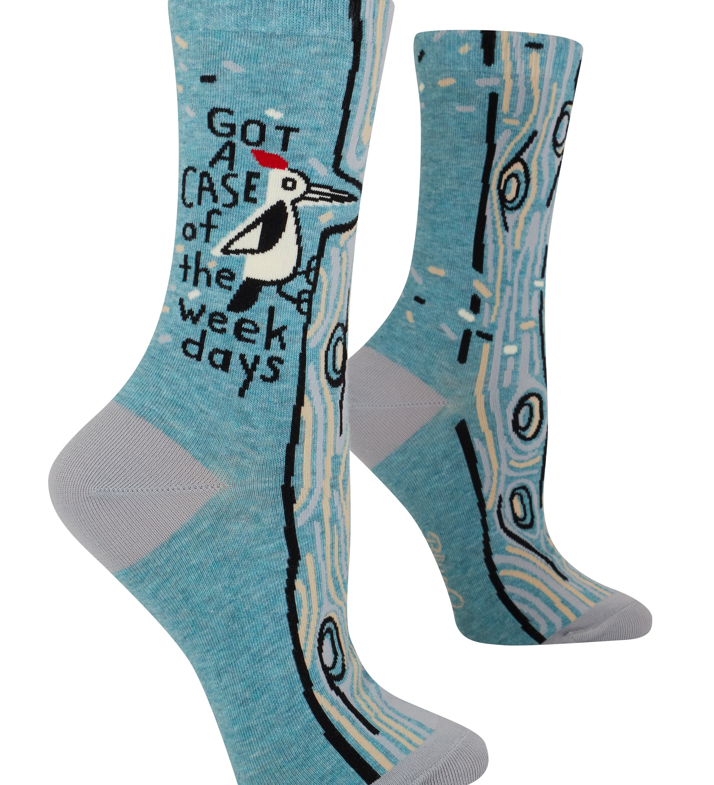 Pair of socks with a woodpecker design and text on a blue background. Avaiable at Be Charmed