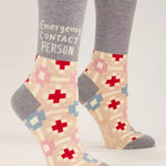 Emergency Contact crew socks – soft cotton blend crew socks printed with “Emergency Contact” info, available at Be Charmed.