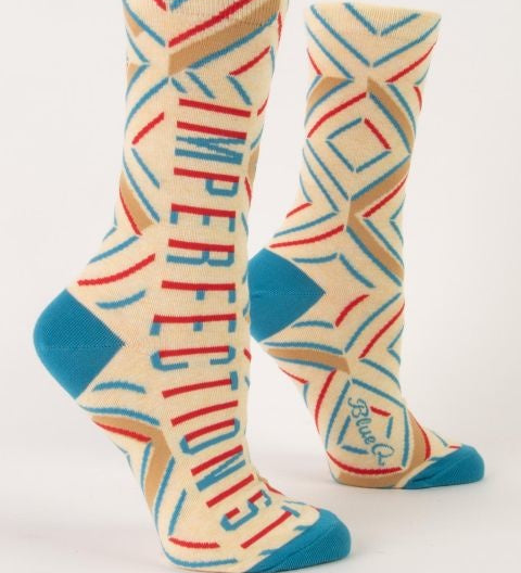 Blue Q "Imperfectionist" Crew Socks featuring a humorous message, available at Be Charmed.