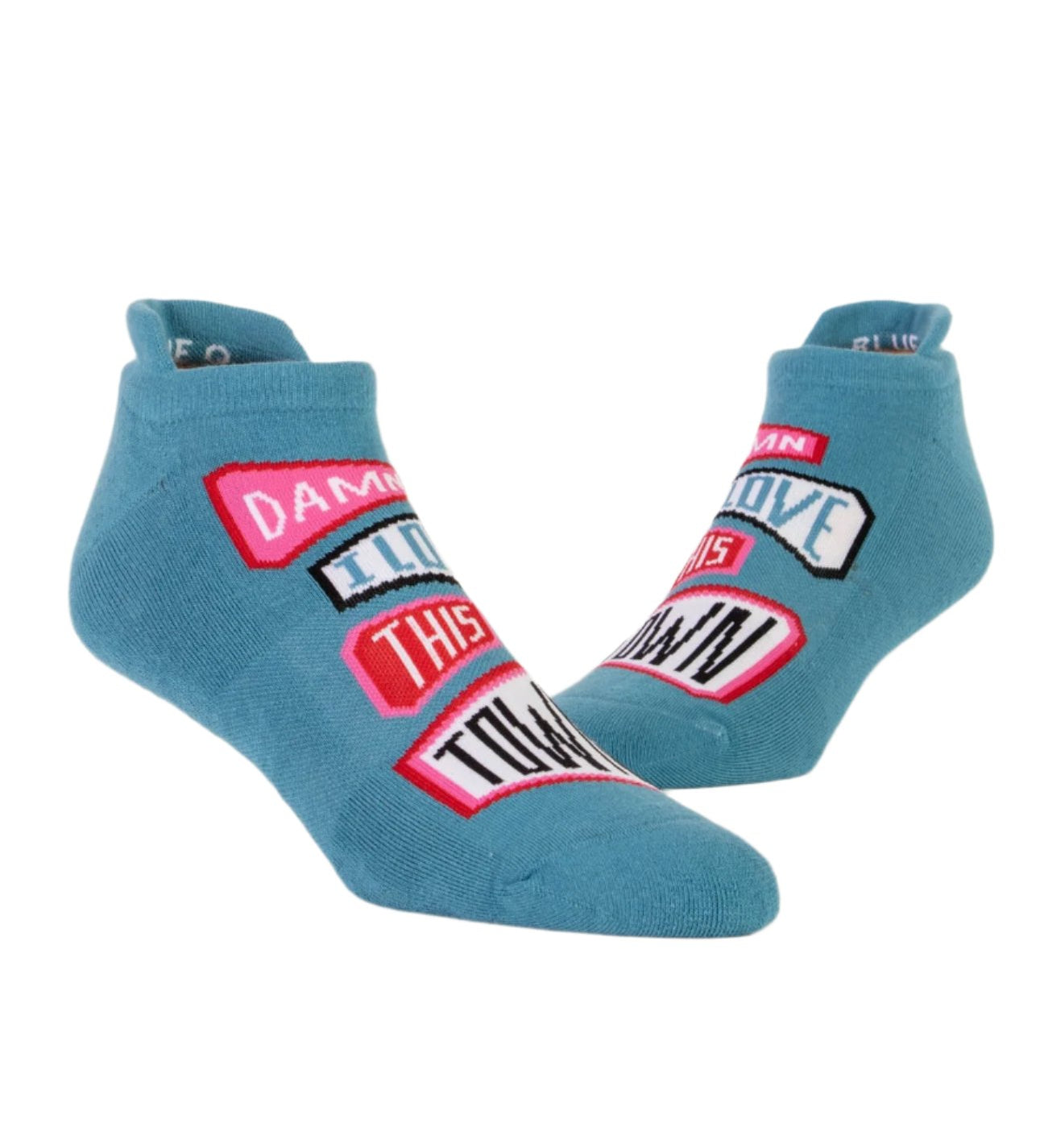 Blue Q "Damn I Love This Town" Sneaker Socks featuring a vibrant design, available at Be Charmed.