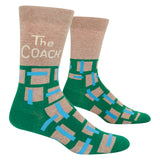 Green and brown socks with 'The Coach' text on a white background. Available at Be Charmed