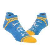 Blue Q Sweatin' Snacks Sneaker Socks – Quirky design and cushioned comfort, available at Be Charmed.