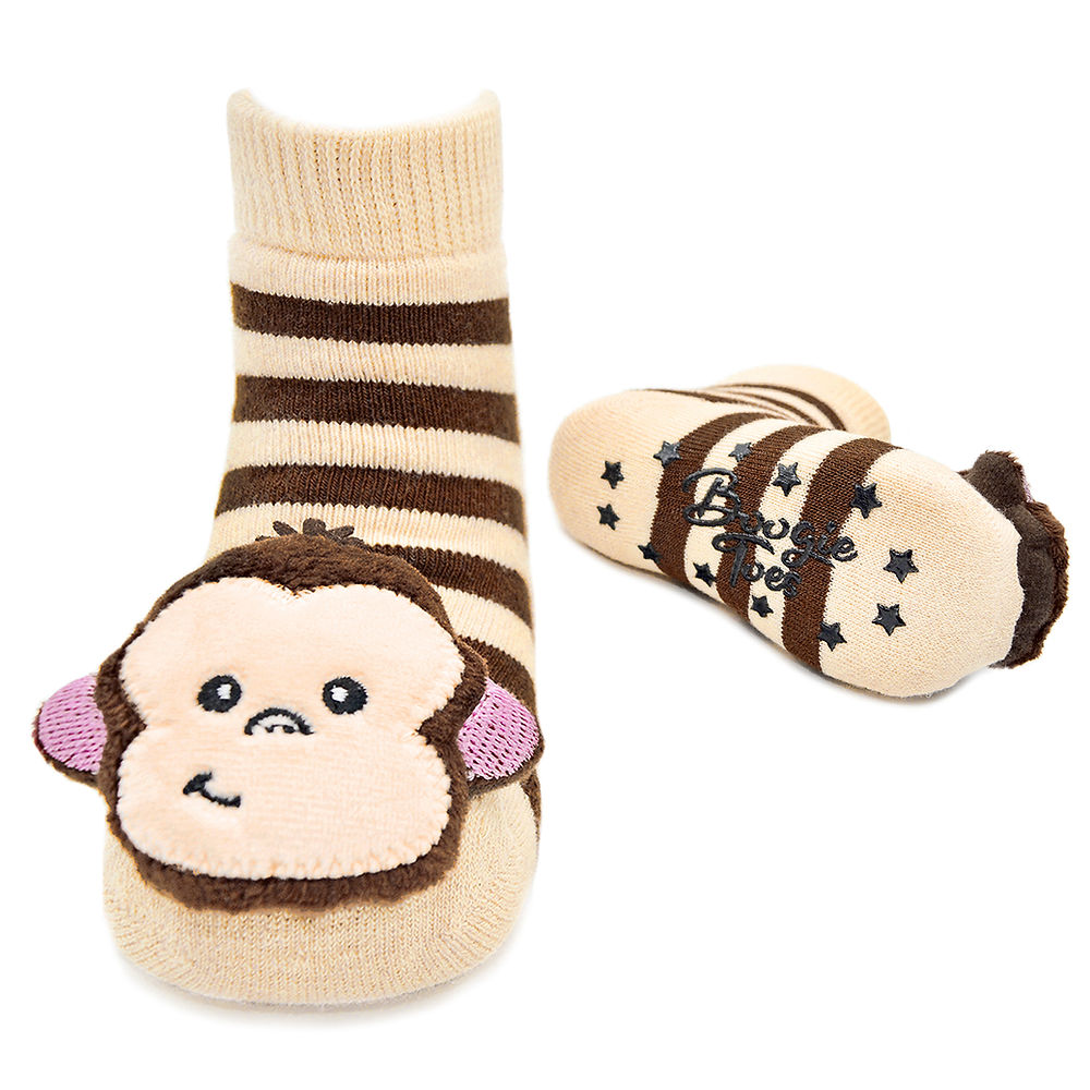 Children's monkey-themed socks with striped design on a white background. Available at Be Charmed