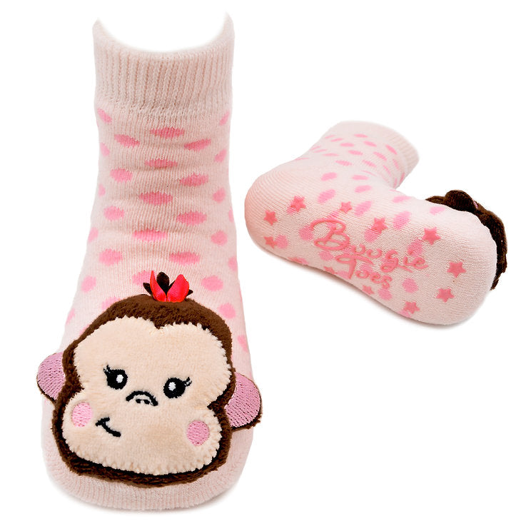 Pink monkey-themed socks with heart patterns on a white background. Available at Be Charmed