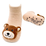 Baby socks with bear face design and matching booties on a white background. Available at Be Charmed