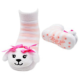 Baby sock with cartoon face and pink bow, and matching bootie with star pattern on a white background. Available at Be Charmed