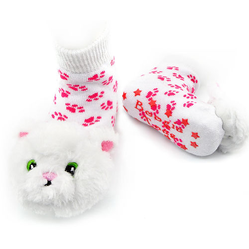 White socks with pink paw prints and cat face design on a white background. Available at Be Charmed