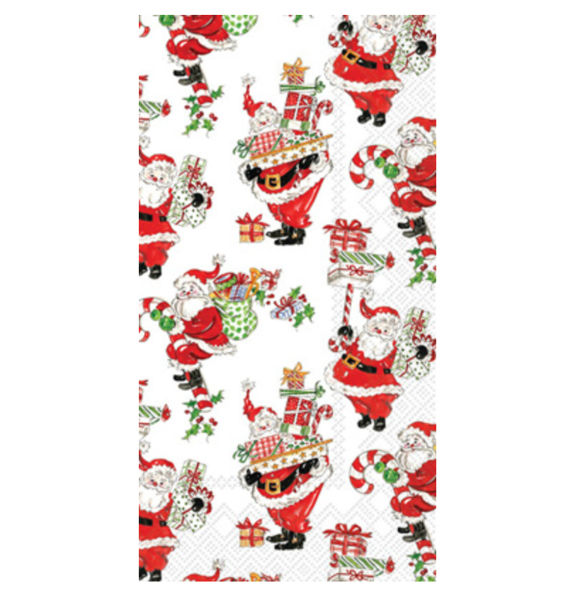 Boston International Holly Jolly guest towels featuring festive holly, mistletoe, and pine design in red and green on 3‑ply paper, available at Be Charmed.