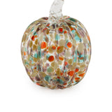 Glass pumpkin with multicolored speckles on a white background. Available at Be Charmed