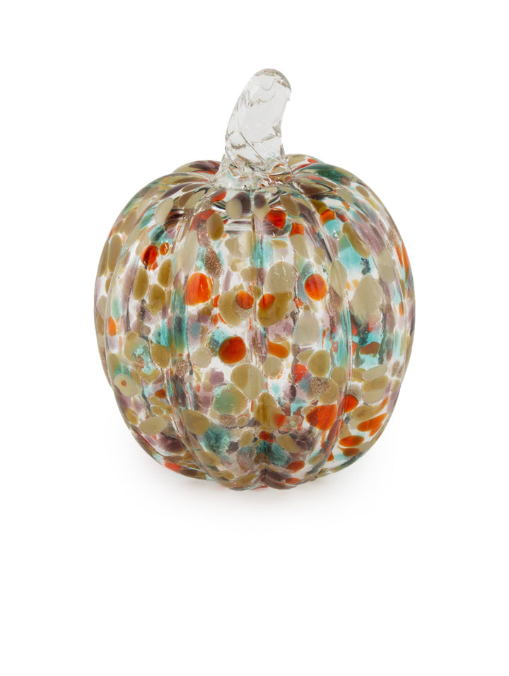 Glass pumpkin with multicolored speckles on a white background. Available at Be Charmed