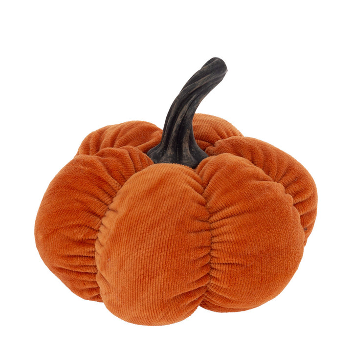 Orange velvet pumpkin with a black stem on a white background. Available at Be Charmed