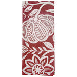 Red towel with white floral and leaf patterns on a white background. Available at Be Charmed