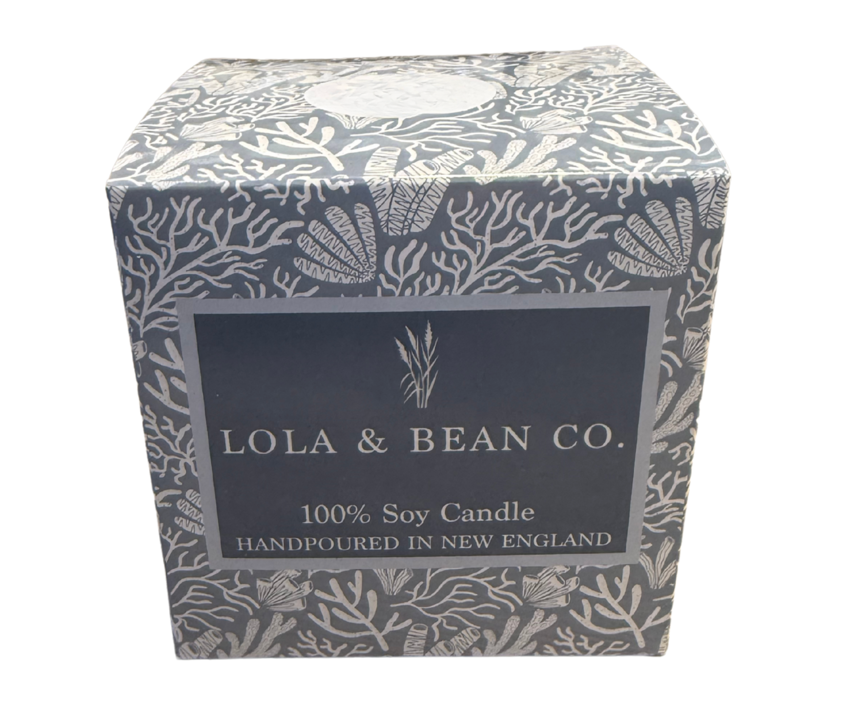 A 3-wick soy candle from Lola & Bean Co., packaged in a black and white box with floral patterns and a label indicating it is hand-poured in New England. Available at Be Charmed