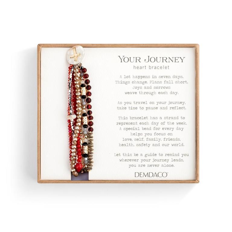 Heart bracelet with a message card on a white background. Available at Be Charmed