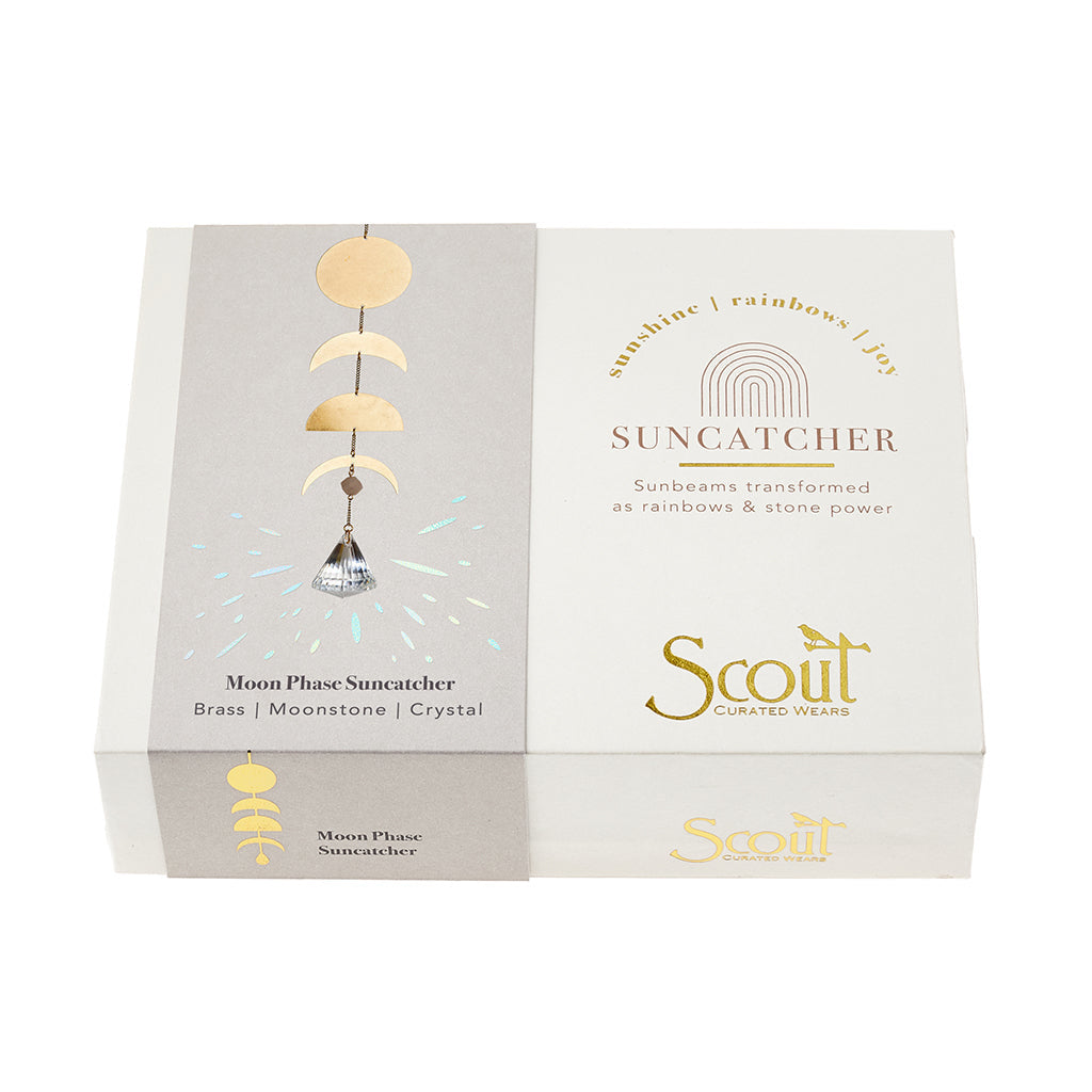 Boxed Moon Phase Suncatcher with Moonstone by Scout Curated Wears. Brings soft light, balance, and celestial charm to any space. Available at Be Charmed.