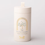 White cylindrical container with 'Tree of Life Suncatcher' design on a light gray background Available at Be Charmed