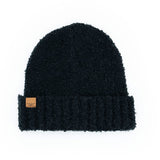 Black Common Good Recycled Hat – eco-friendly knit beanie made from recycled materials, soft, warm, and sustainably stylish, available at Be Charmed