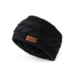 Black Headwarmer – soft knit winter headband designed to keep ears warm with a stylish, snug fit and minimal bulk, available at Be Charmed