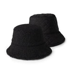 Black Reversible Sherpa Bucket Hat – cozy dual-sided winter hat with plush sherpa on one side and smooth fabric on the other, stylish and warm, available at Be Charmed