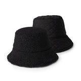 Black Reversible Sherpa Bucket Hat – cozy dual-sided winter hat with plush sherpa on one side and smooth fabric on the other, stylish and warm, available at Be Charmed