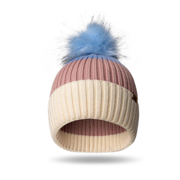 Blue Kid’s Pom Hat – soft knit winter hat with fluffy pom and ribbed cuff, designed for warmth and comfort in cold weather, available at Be Charmed
