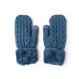 A pair of blue cozy cable knit mittens with a plush lining and cuff. Available at Be Charmed