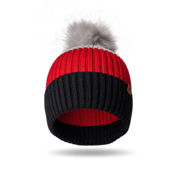 Gray Kid’s Pom Hat – soft knit winter hat with fluffy pom and ribbed cuff, designed for warmth and comfort in cold weather, available at Be Charmed