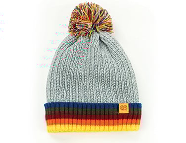 Gray Kid’s Plush Pom Beanie – soft knit winter hat with oversized plush pom and snug fit, designed for warmth and cuteness, available at Be Charmed