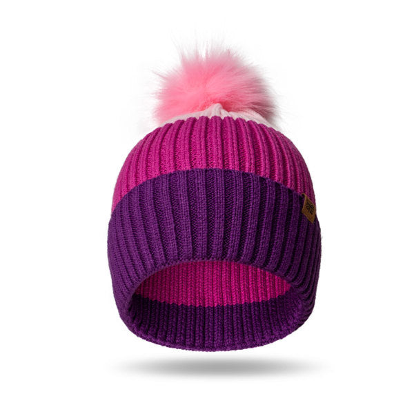 Pink Kid’s Pom Hat – soft knit winter hat with fluffy pom and ribbed cuff, designed for warmth and comfort in cold weather, available at Be Charmed