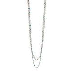 A delicate artisan-crafted Silver/Turquoise beaded layering chain necklace from the CAI jewelry collection, available at Be Charmed.