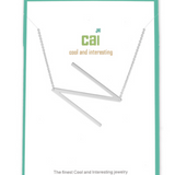 N Silver Initial Necklace by CAI, 16" chain with 2" extension, featuring a sleek silver-plated initial pendant, available at Be Charmed.