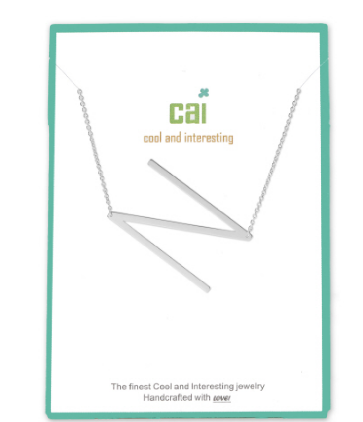 N Silver Initial Necklace by CAI, 16" chain with 2" extension, featuring a sleek silver-plated initial pendant, available at Be Charmed.