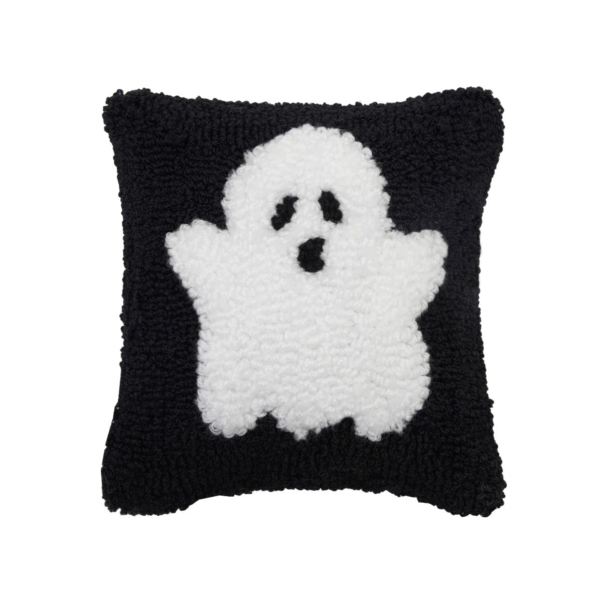 A festive mini Halloween accent pillow featuring a playful spooky ghost design in detailed texturized hooked yarn, available at Be Charmed.