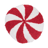 A festive mini round winter accent pillow designed in the shape of a classic holiday peppermint candy with textured hooked yarn, available at Be Charmed.