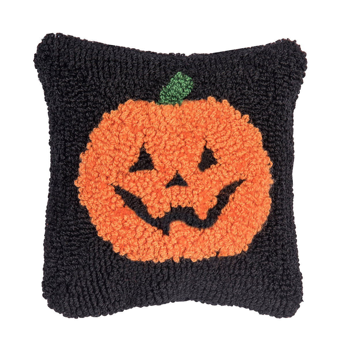 A festive autumn accent pillow featuring a plump orange harvest pumpkin design in detailed texturized hooked yarn, available at Be Charmed.