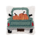 A festive autumn accent pillow featuring a plump orange harvest pumpkin design in detailed texturized hooked yarn, available at Be Charmed.