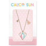 Carrie Gem Necklace by Calico Sun—a diamond-shaped pastel enamel gem pendant with tiny gold star and peach tassel on adjustable gold ball chain, available at Be Charmed.